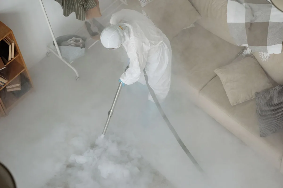 Biohazard cleanup technician in protective equipment, Wolfforth, TX